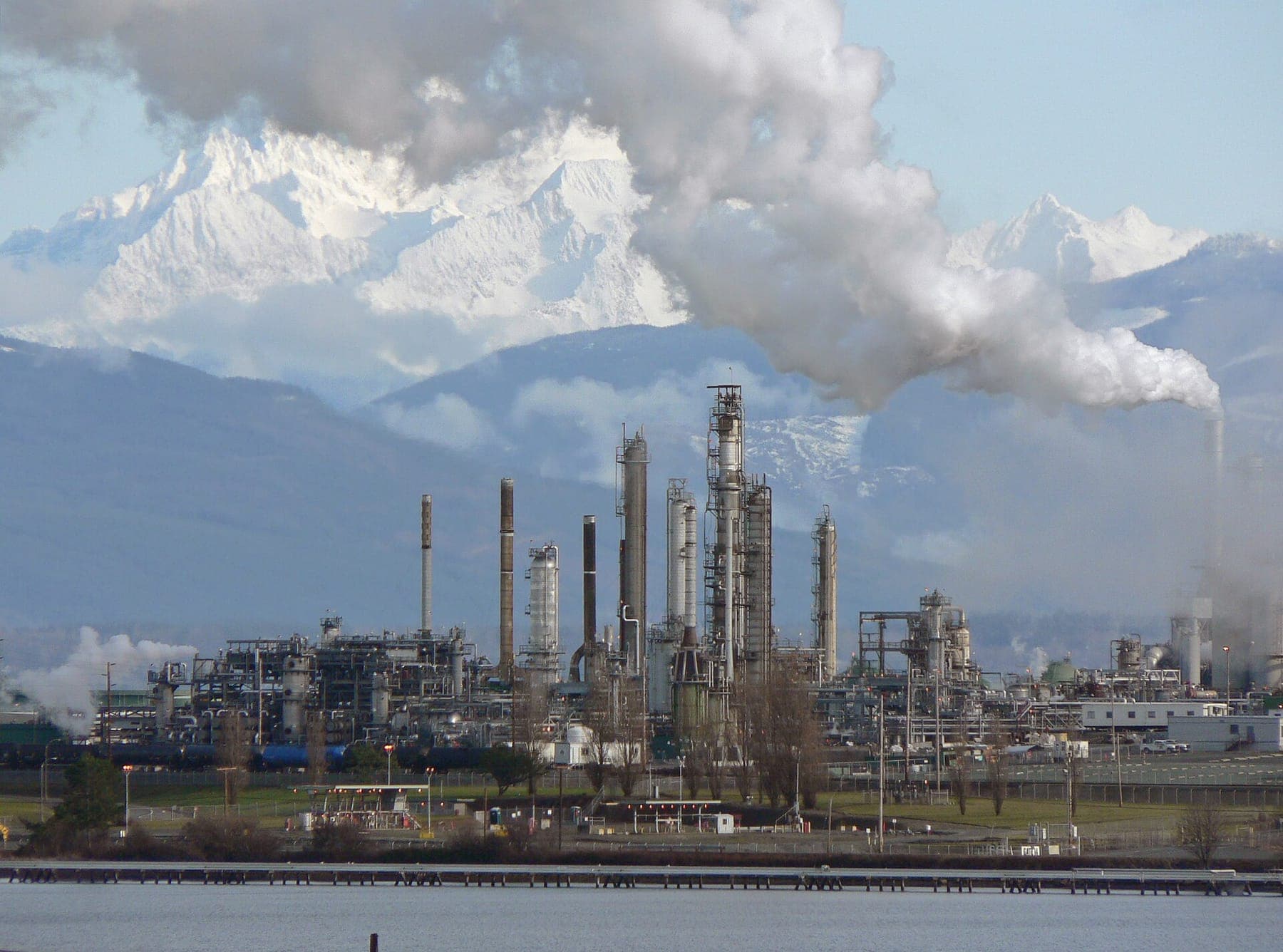 A refinery with distillation columns venting steam